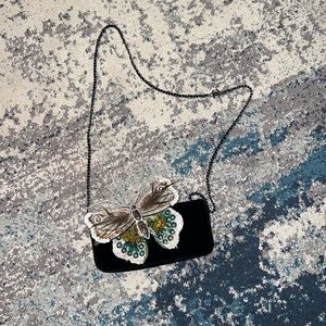 Chanel Butterfly Feather &
Sequin Chain Clutch